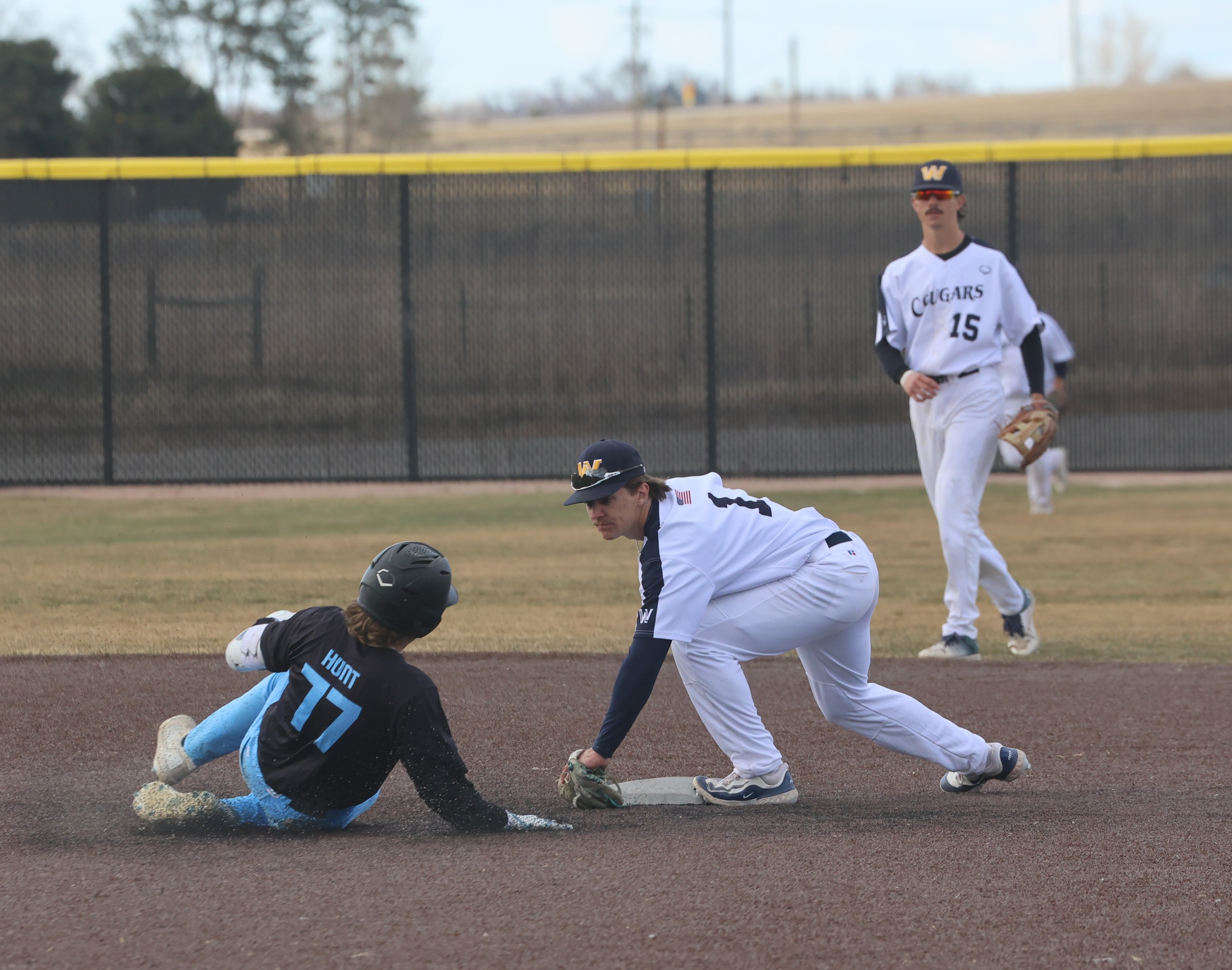Landon Lockwood waits for a sliding Southeast runner as he tags him out at second base in game two of their game on Friday.