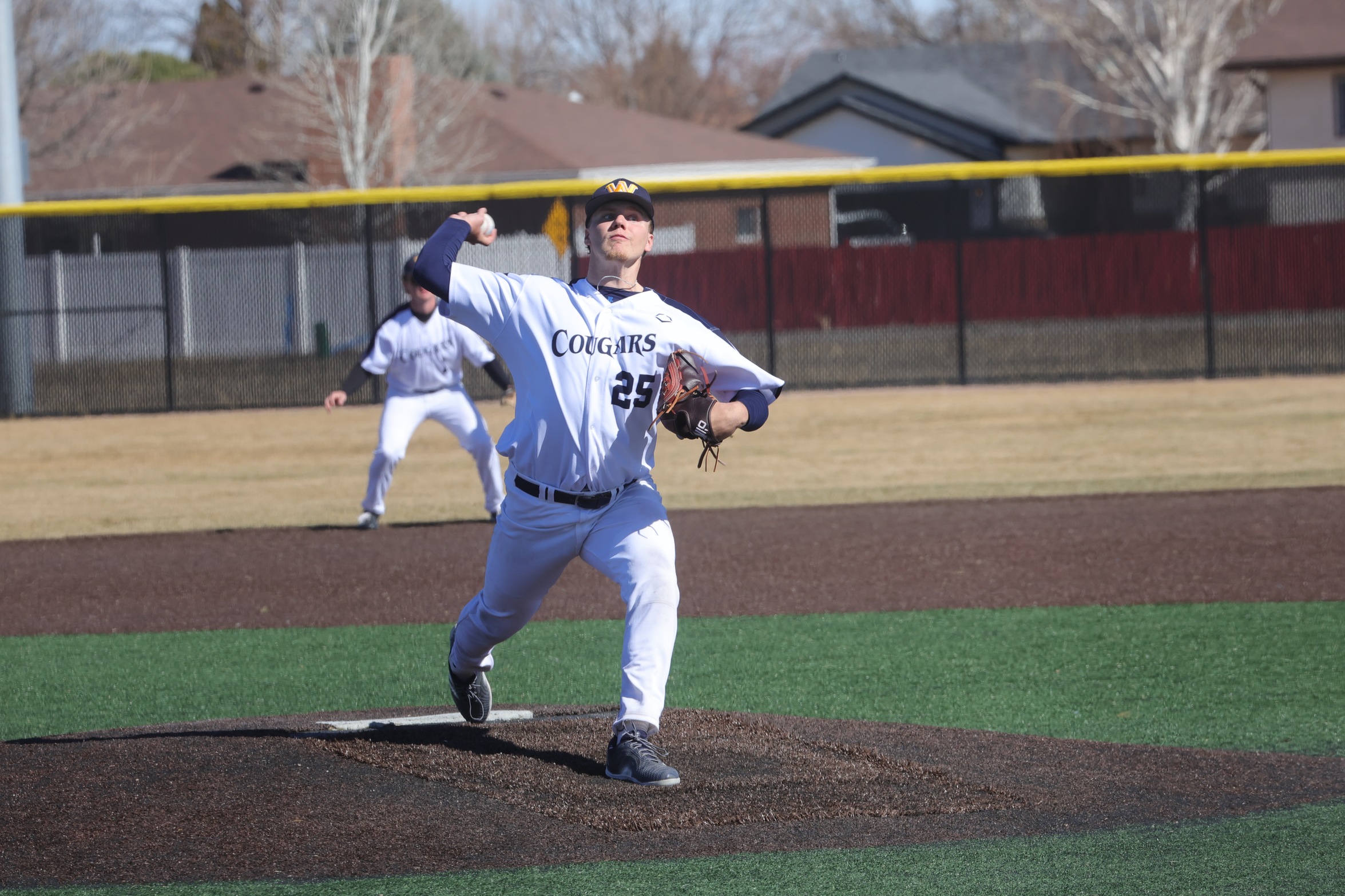 Carter Reisig delivers a pitch in the first game against Dawson on Saturday.