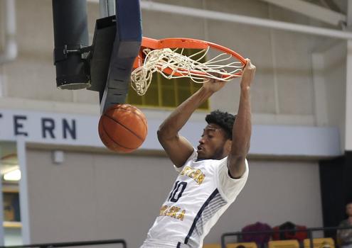 A dunk by a Cougar