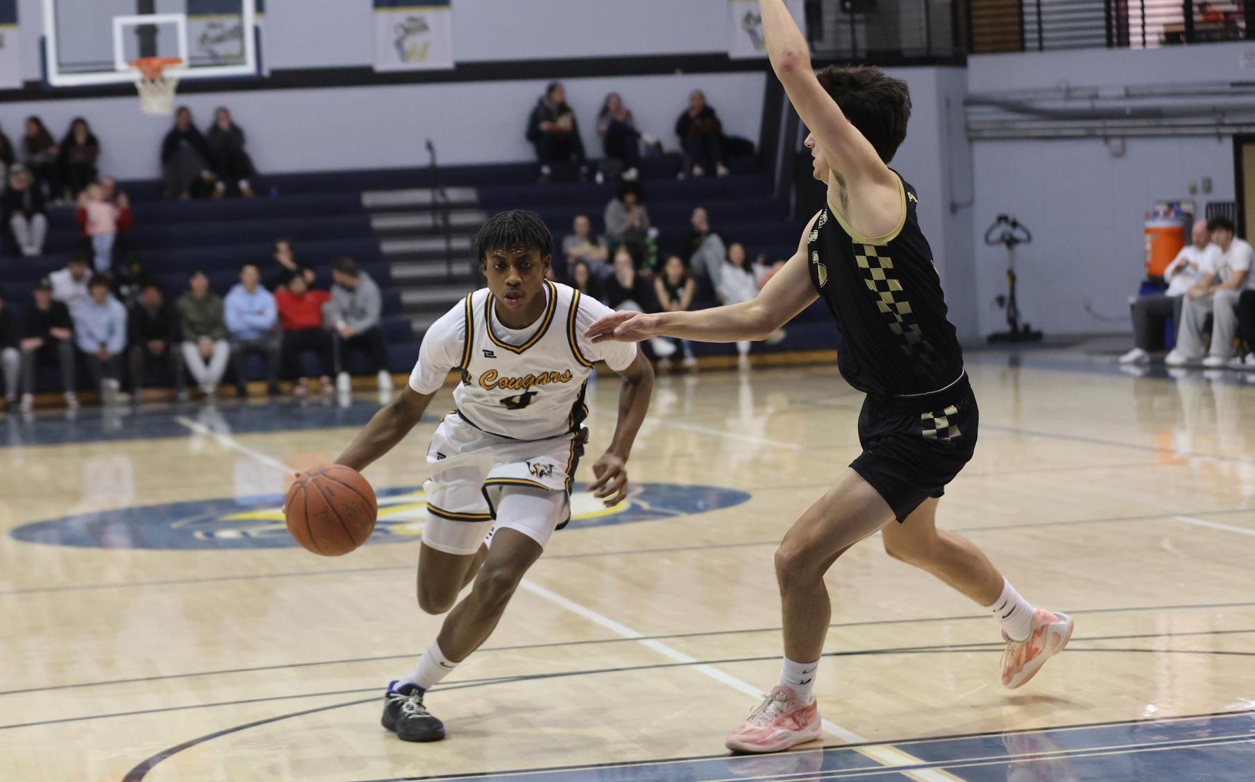 Isaiah St. Preux drives to the bucket against NJC on Monday.