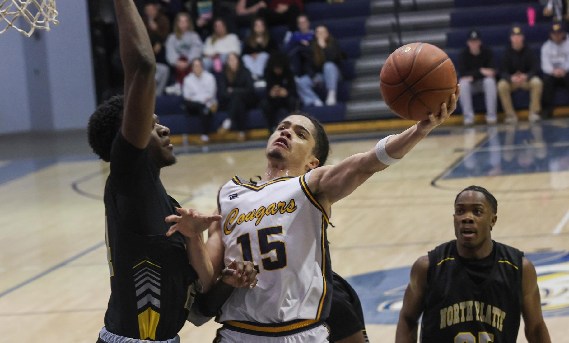 Elijah Burney goes up for a bucket in the first half against North Platte on Wednesday.