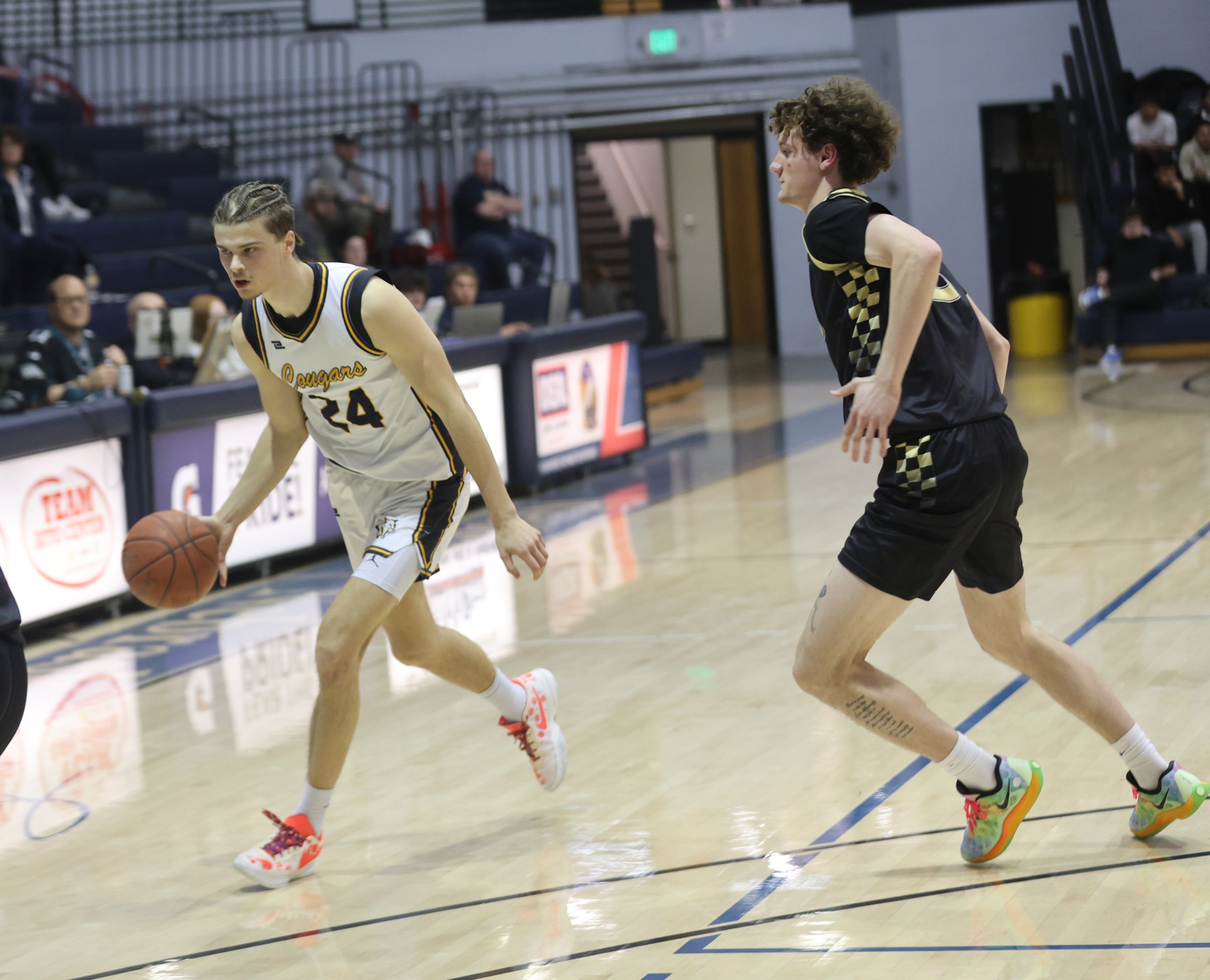 Action when NJC visited Cougar Palace for a game.