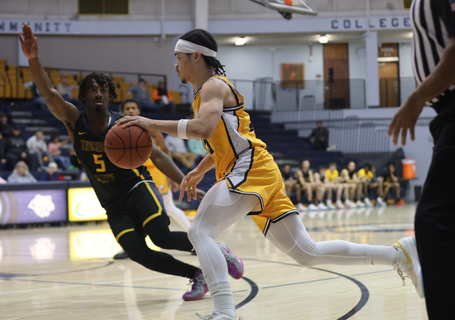 Reece Randolph drives to the bucket in a game with Trinidad on Saturday.