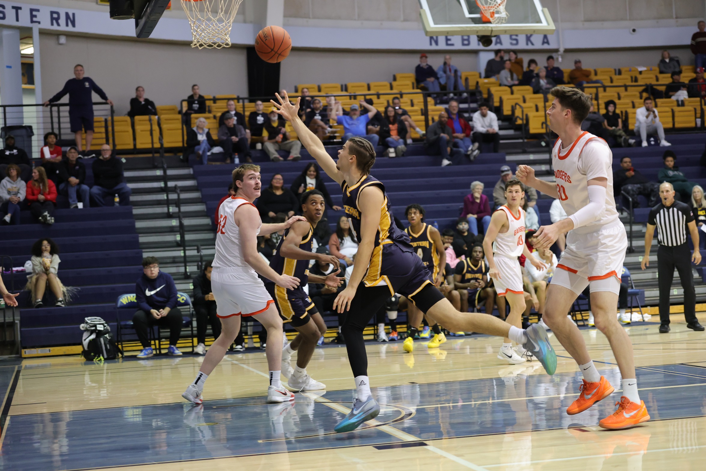 Toms Linis goes up for a lay-up in the second half against Snow.