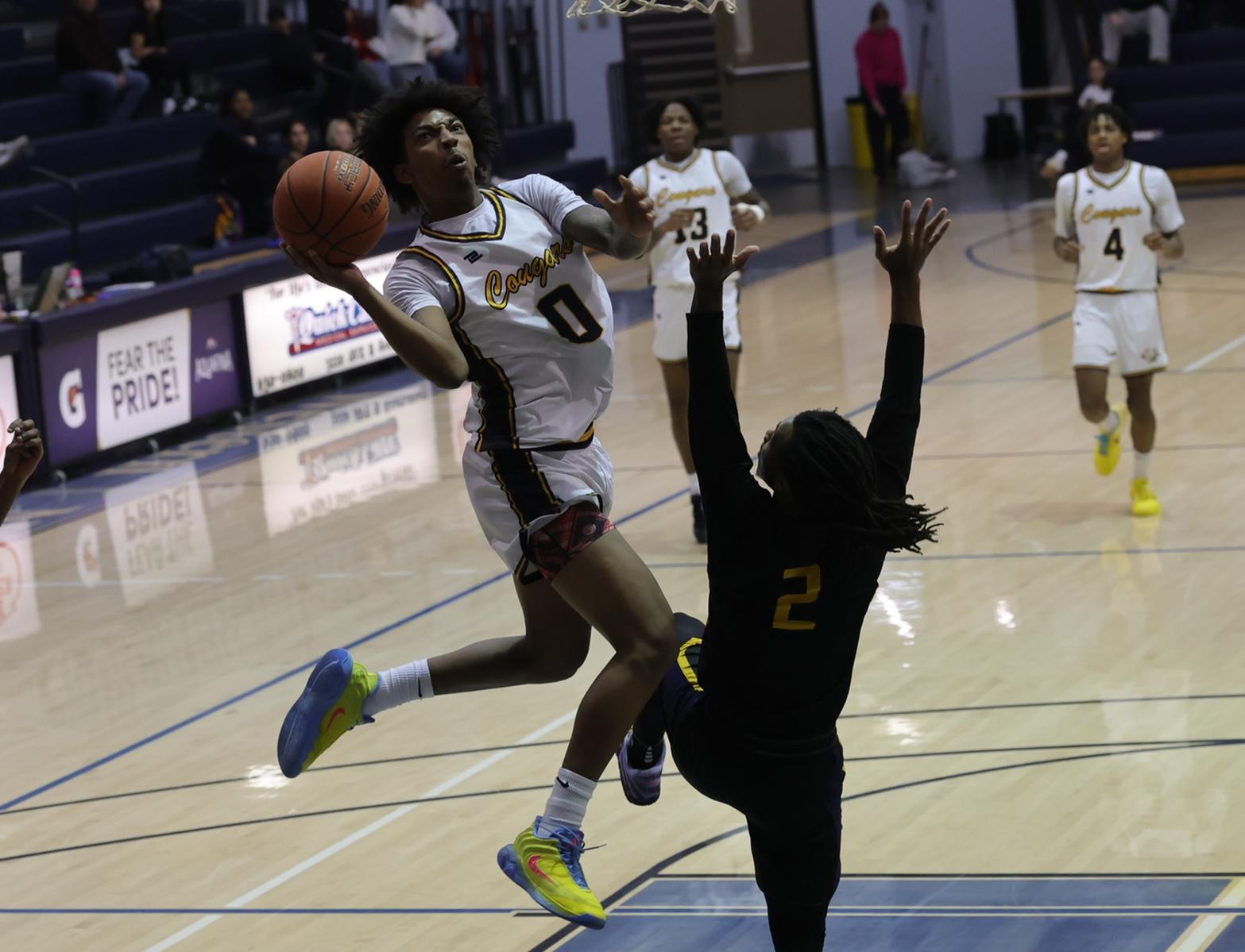 Xavier Kirkpatrick goes up for a bucket in the first half against Trinidad.