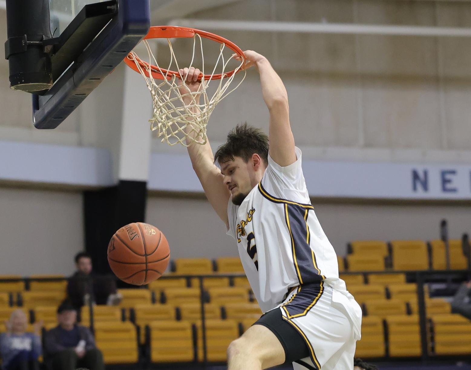 Viktor Lukic-Gavric slams home two points in the second half. WNCC fell 83-80 to Dawson on Monday.