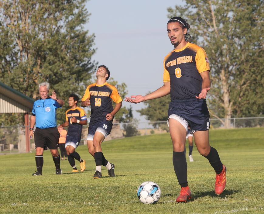 Rodrigo Cercal brings the ball up the field.