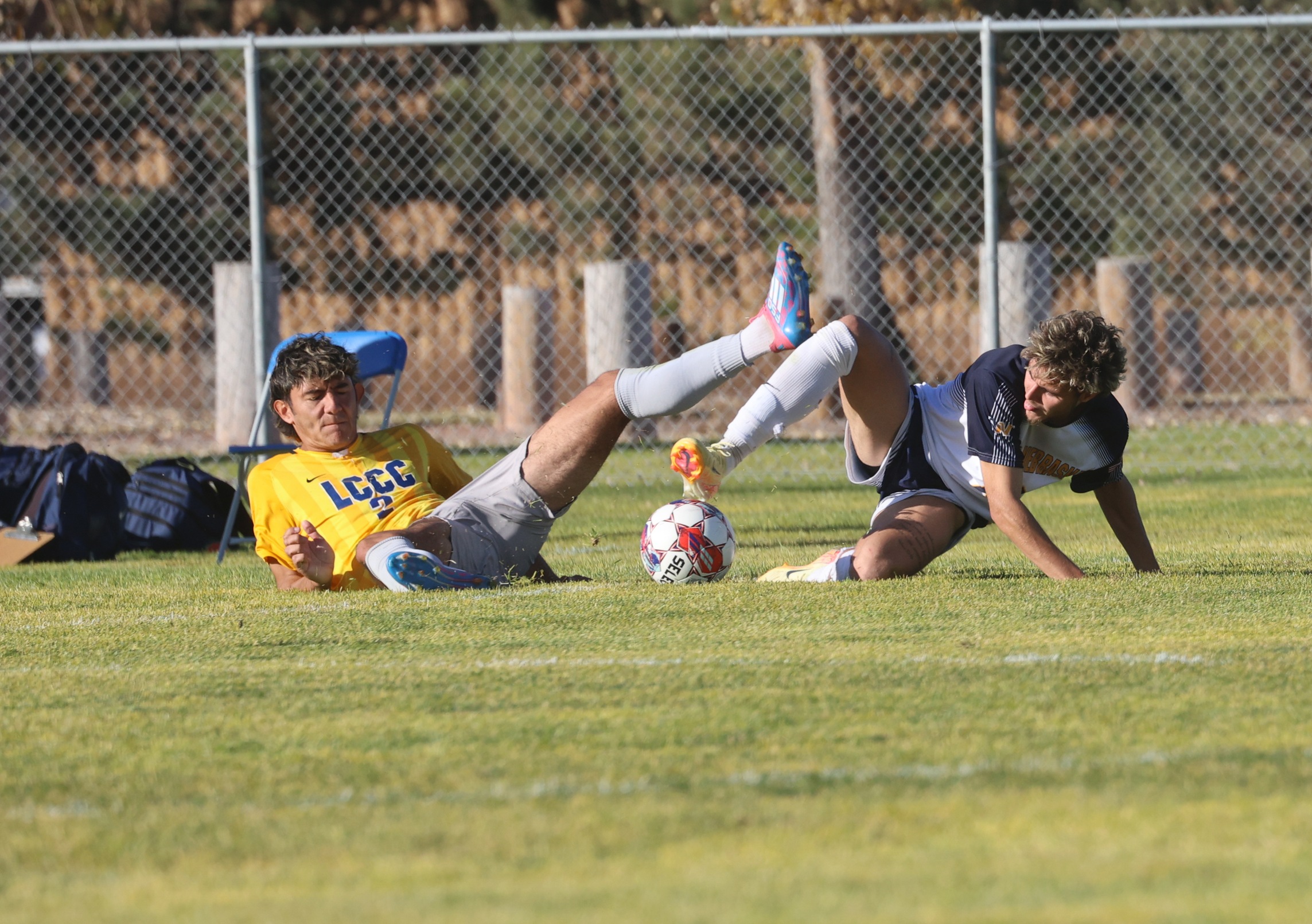 Eduardo Oliveira makes a sliding defensive play that starts the drive to score the only goal of the match against LCCC on Saturday.