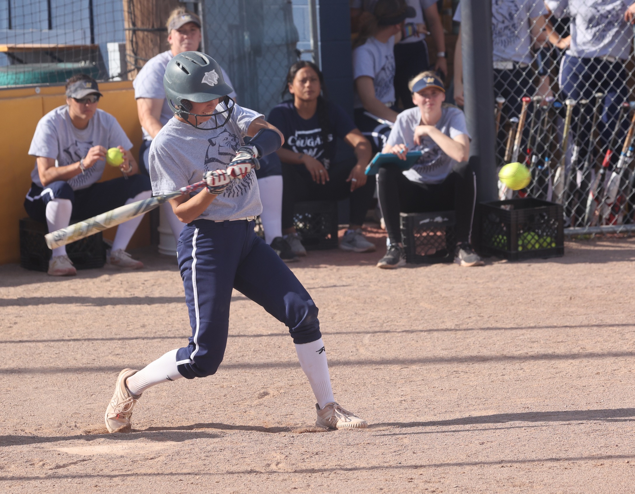 Avery Fox swings for a home run in the fall.