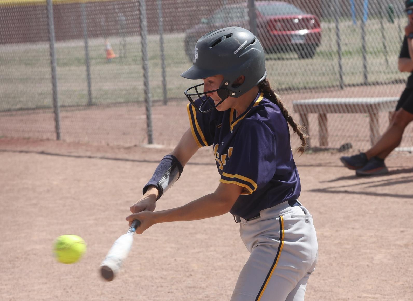 Katelyn Czerpak gets a hit in the first game with Luna