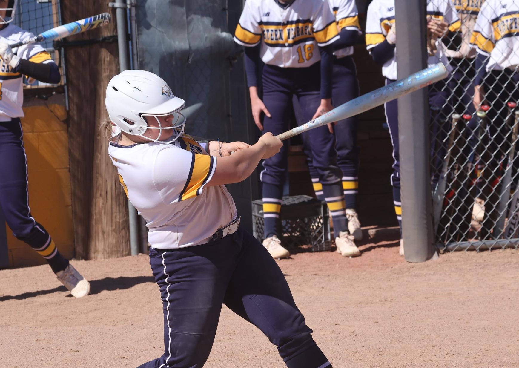 Addi Duke makes contact with the ball and drives the ball for a hit against Lamar Community College