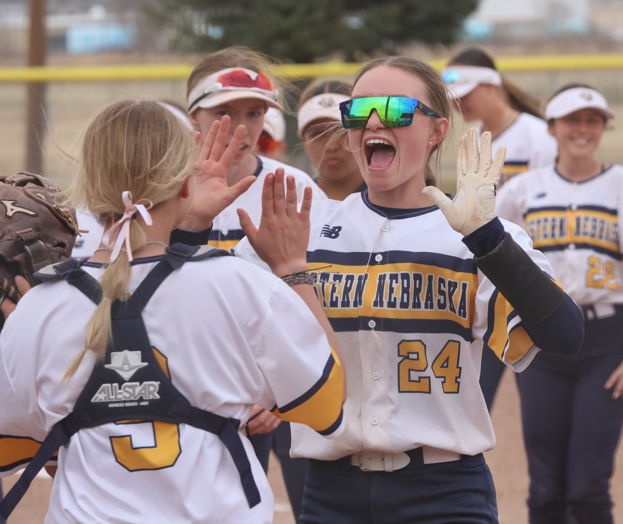 Kallie Stocking celebrates the game two win with Randi Mitchell after the game.