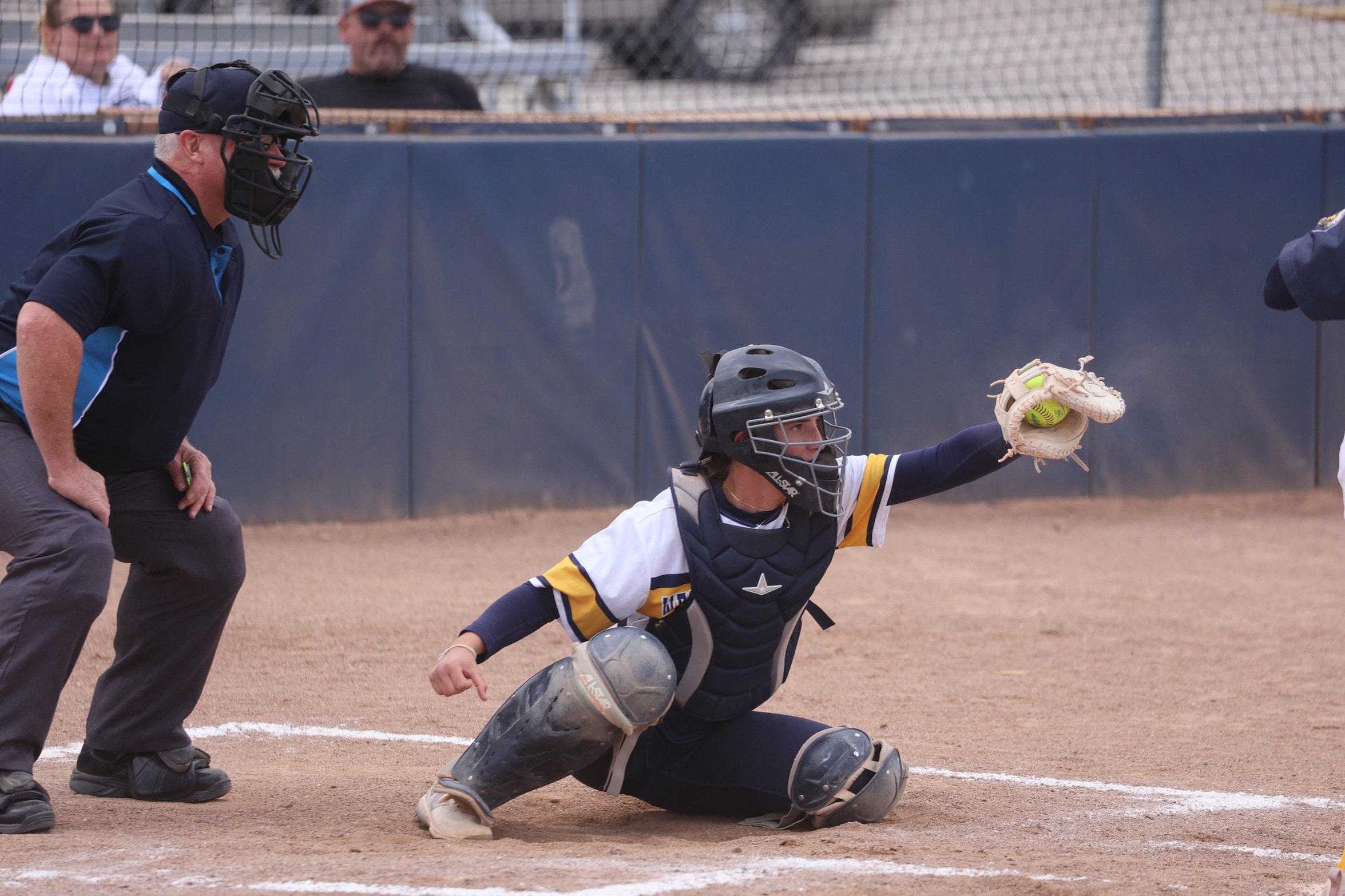 Ellie Soper lets the dust from her glove leave after catching a ball behind the plate. WNCC won both games on Friday over Trinidad.