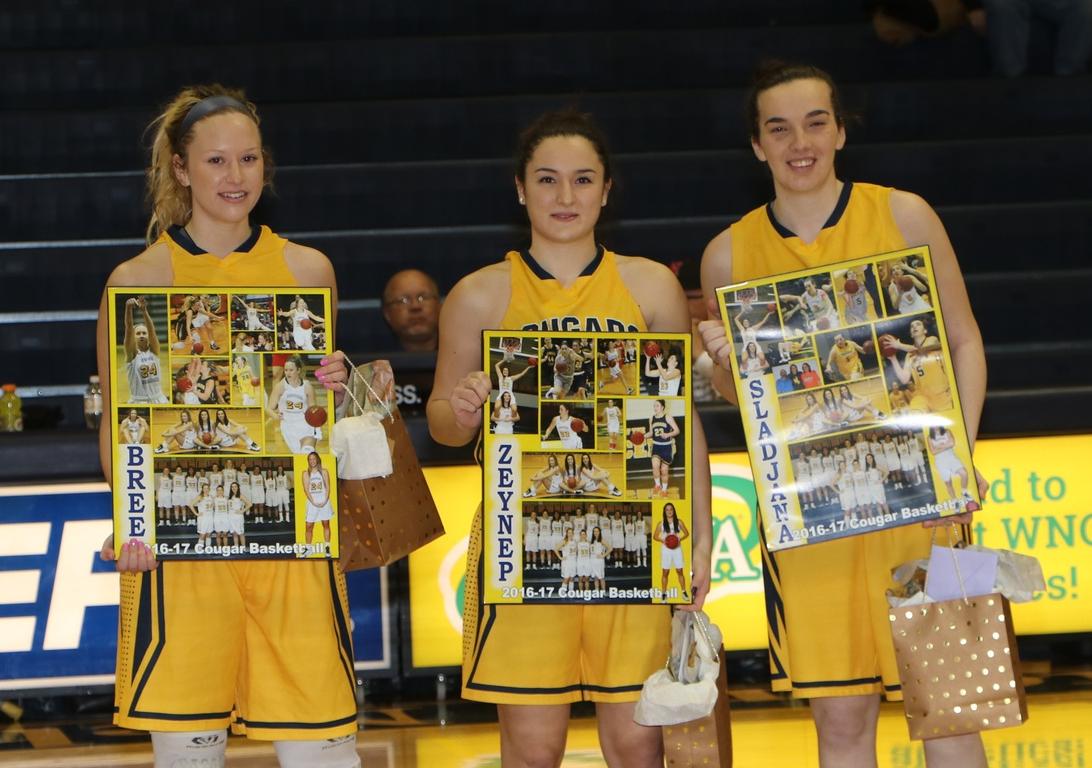 Bree Paulson, Zeynep Canbaz, and Sladjana Rakovic show the frames they were presented during sophomore recognition night at Cougar Palace.