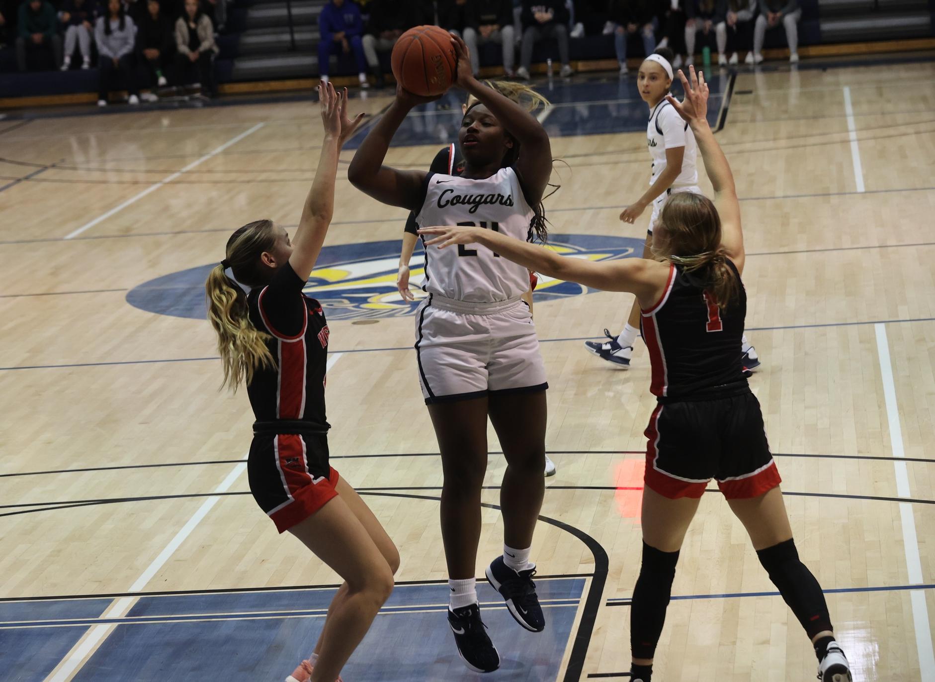 Mackenzie Joseph goes up for two points.