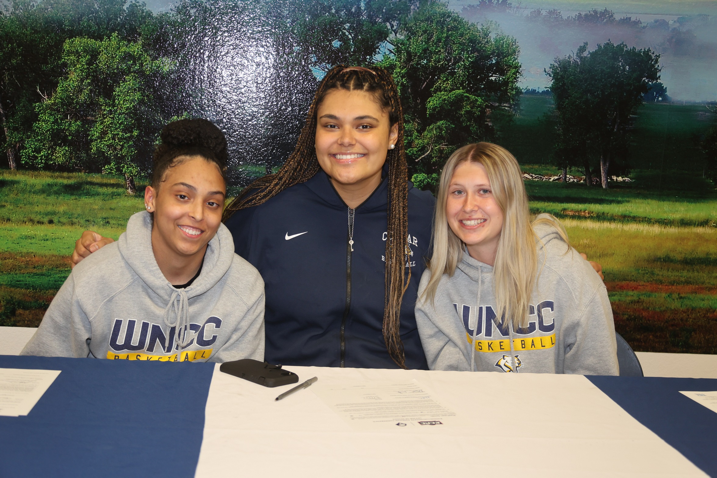 Jayla Owen, Rashaan Smith, an Bre Fowler after signing their letter of intents.