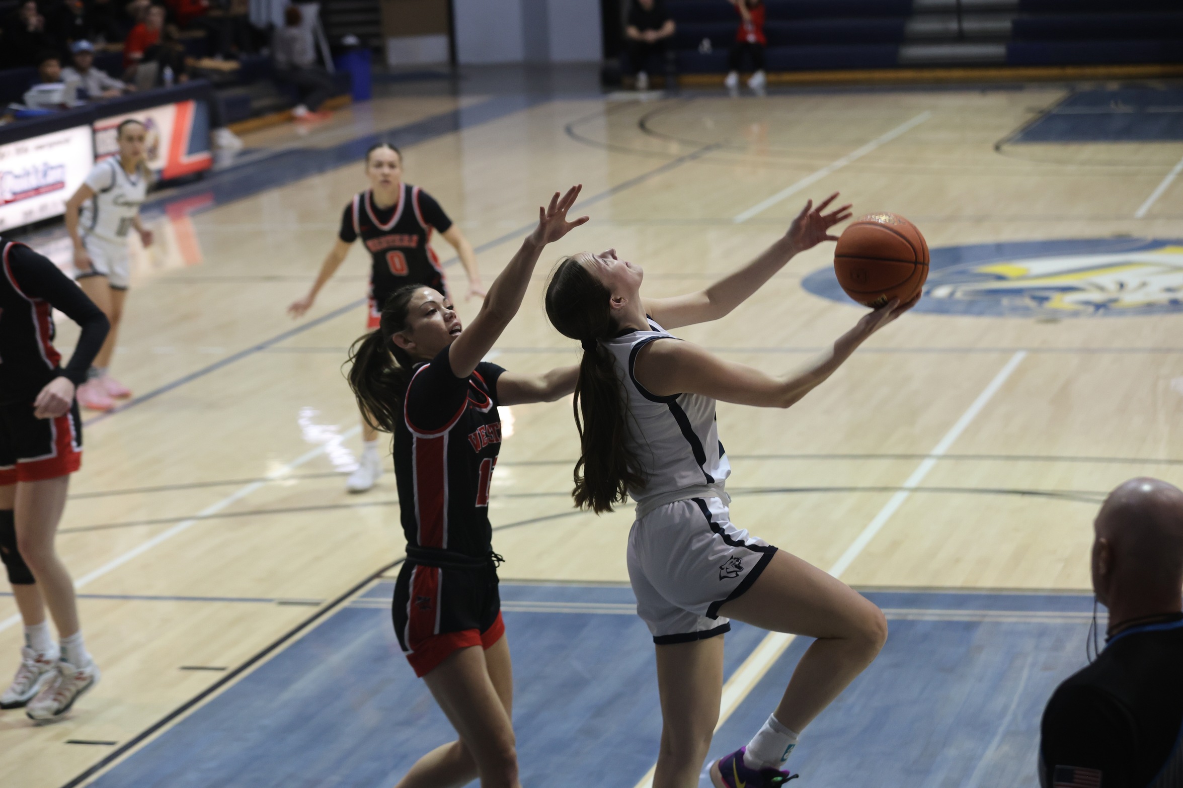 Carleigh Pszanka goes for a reverse shot in the Western Wyoming game on Friday.