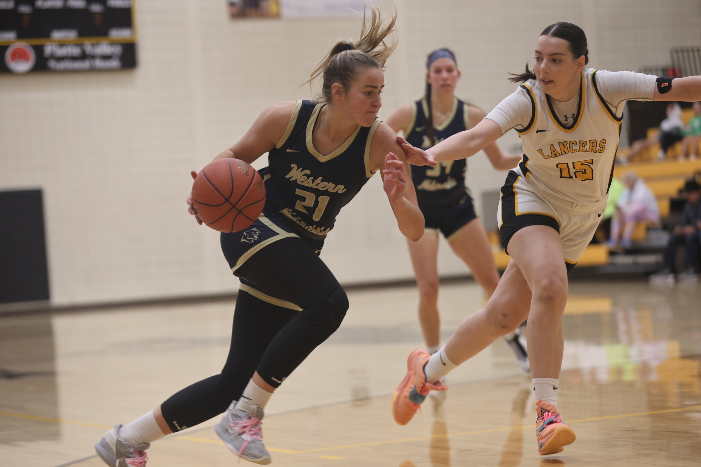 Adelina Urtane drives to the bucket during their game with EWC on Tuesday.