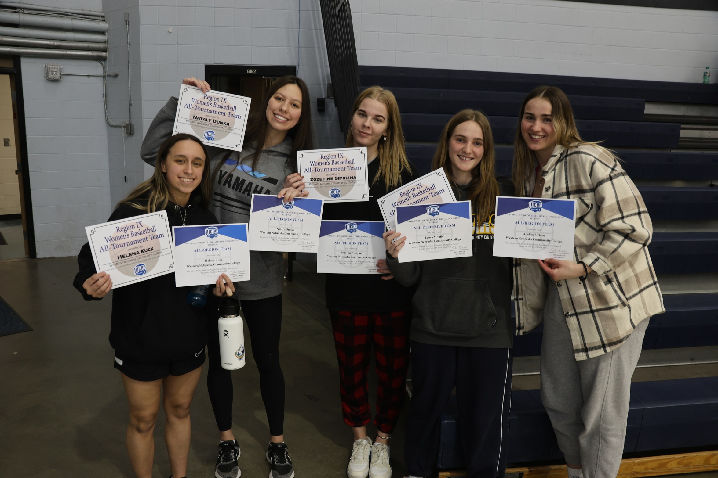 The Cougar players and their awards they received after the tournament on Saturday.