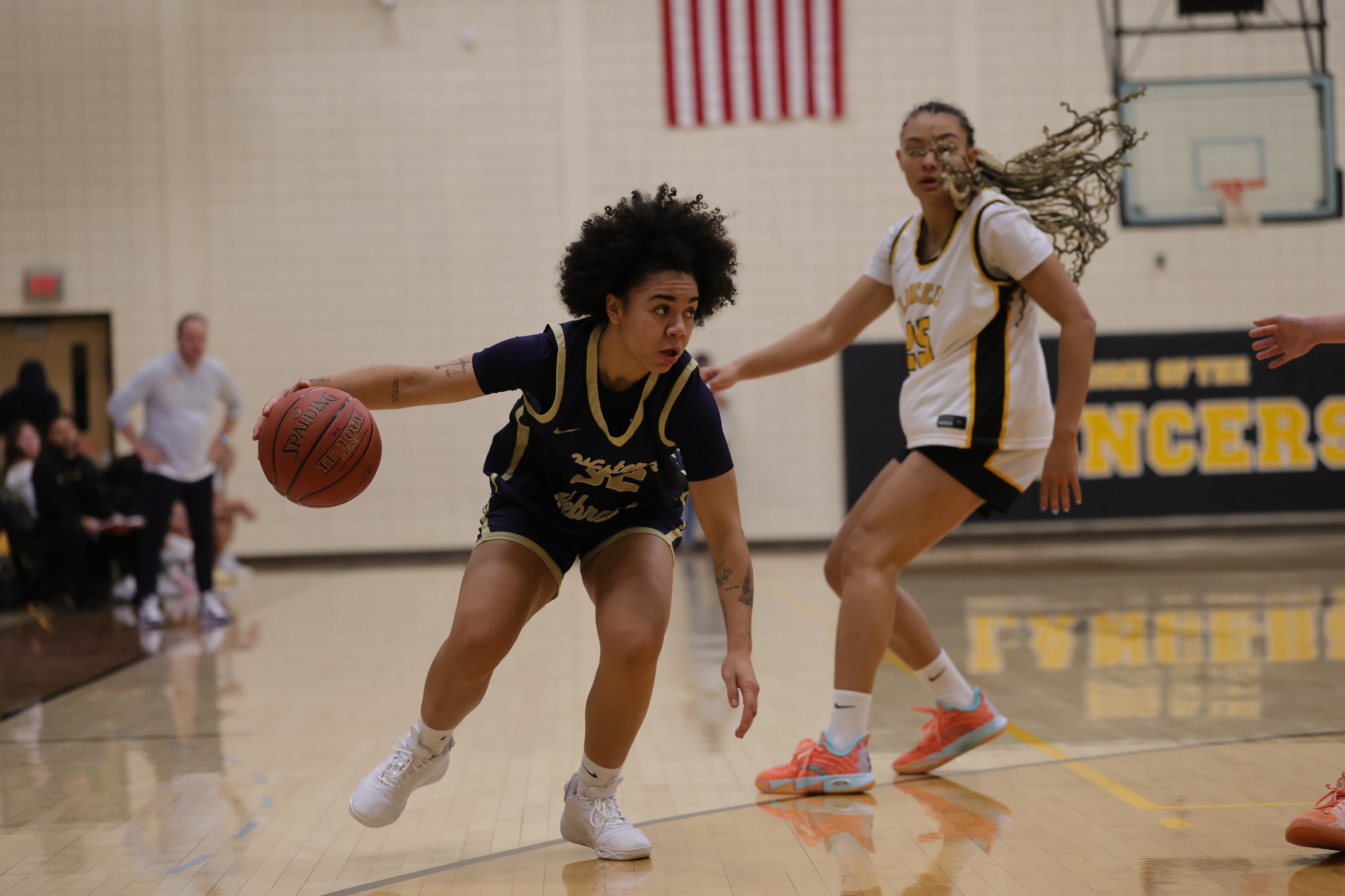 Ella Chesta-Carty looks to make a move to the basket as she brings the ball up the court.