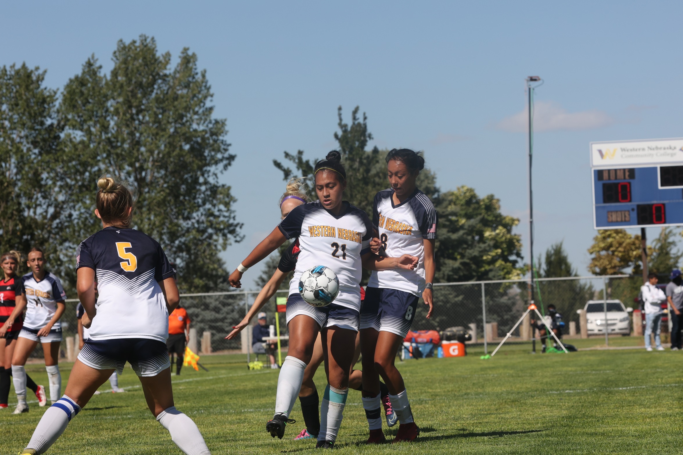 Cougar player going for a kick.