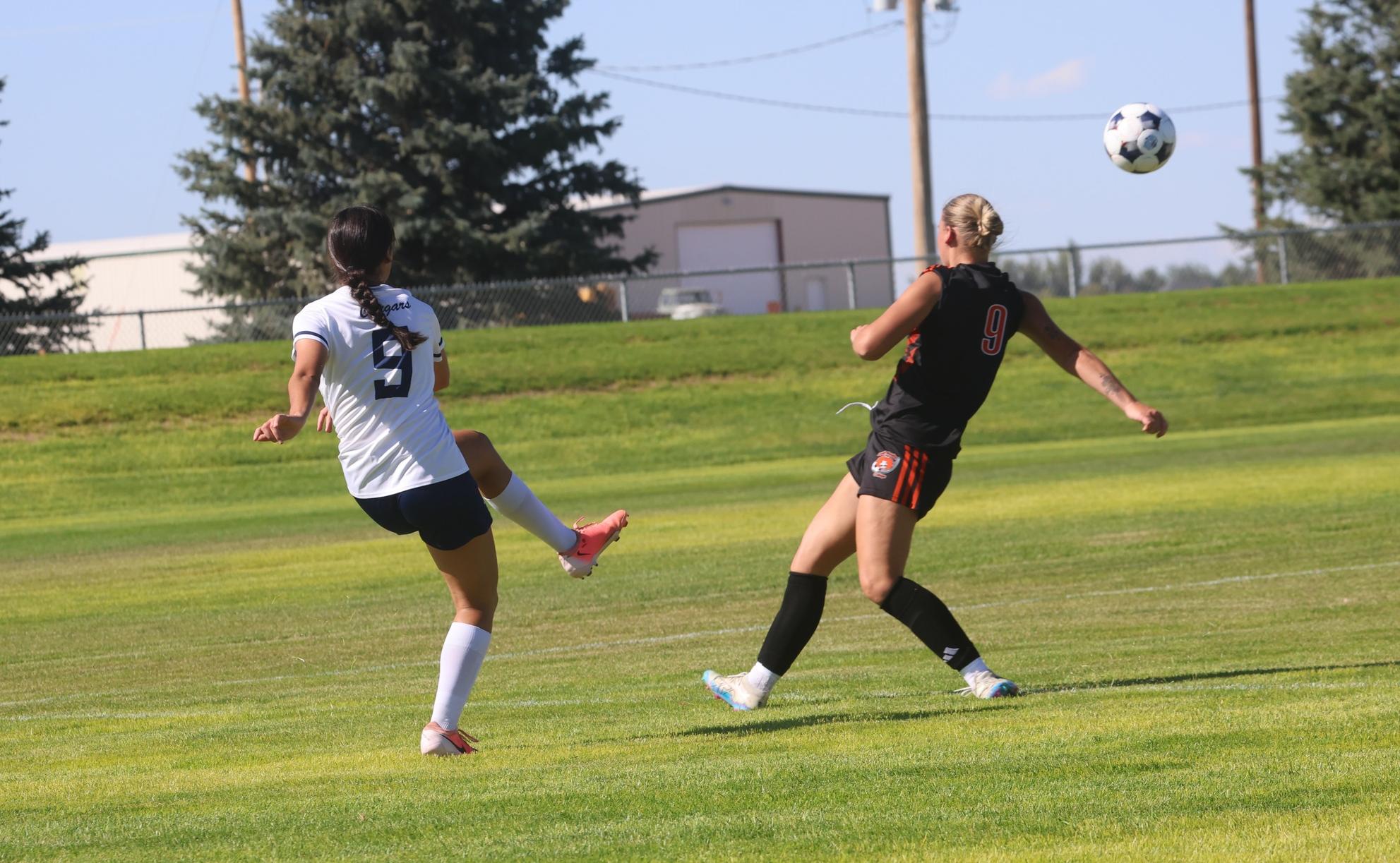Allison Herbel shoots and scores her goal in their match Friday against Central Wyoming.