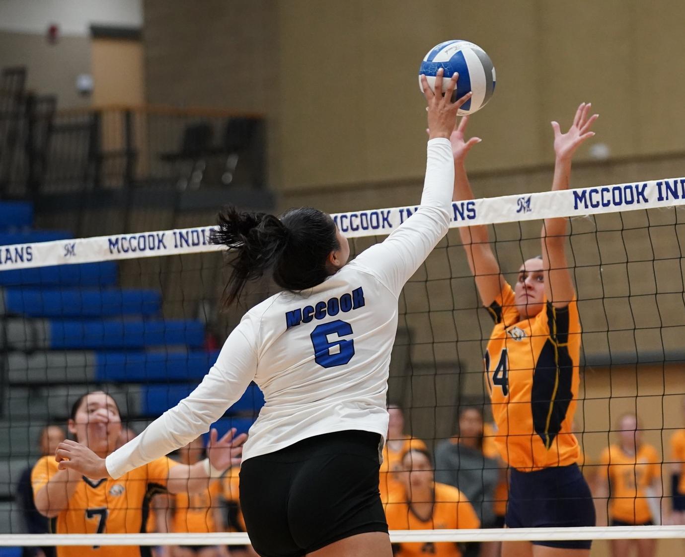 Erica Fava goes up for a block against McCook.