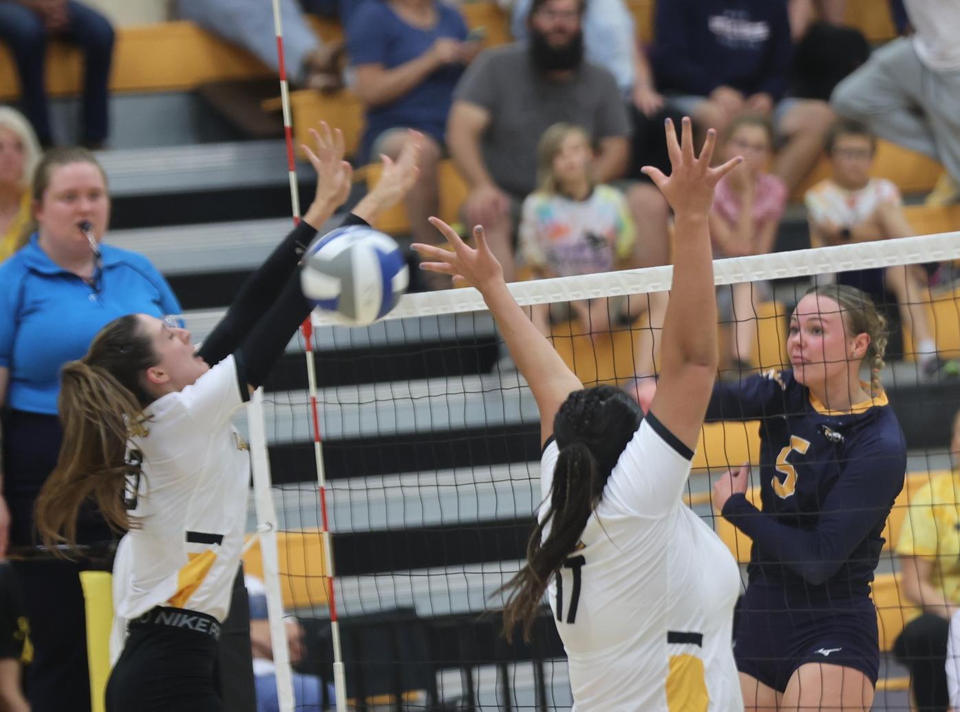 Lilly Zwart hits through the block of EWC.