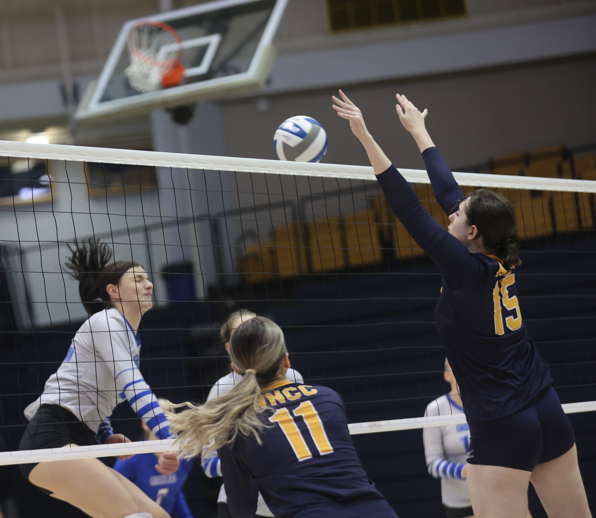 Maya Angelova goes up for a block.