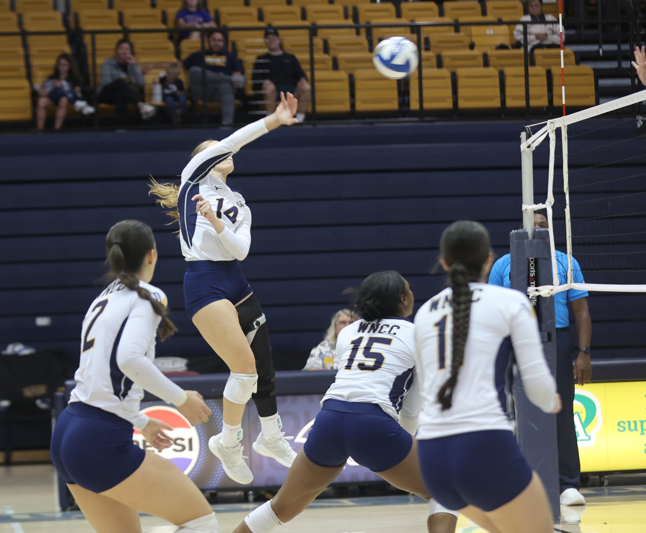 Jaylen Nachtigall goes up and hits one of her nine kills in the Cougar's sweep of Casper College on Tuesday.