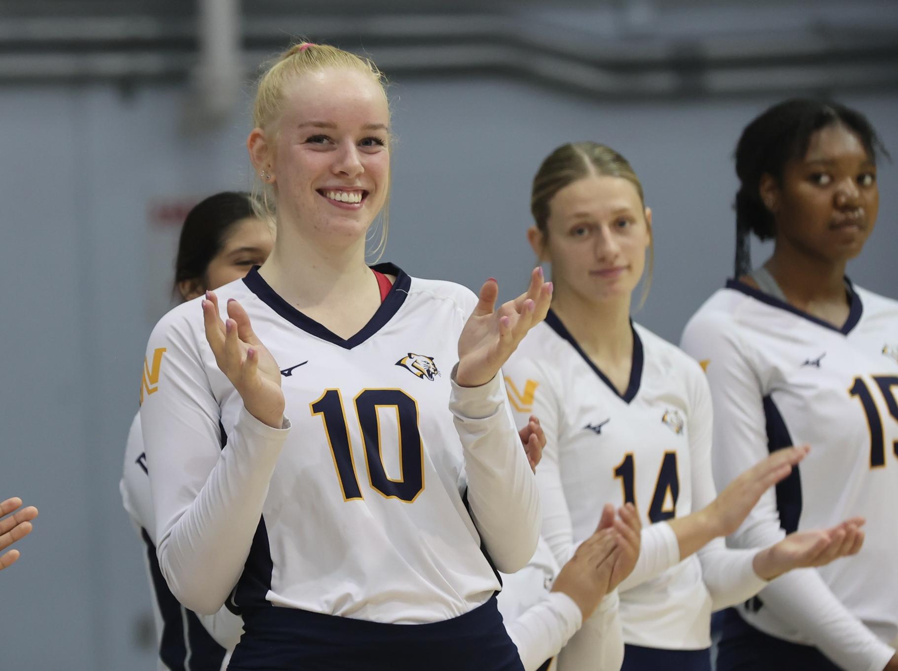 Finja Schul waves to the crowd after being introduced in the EWC game.