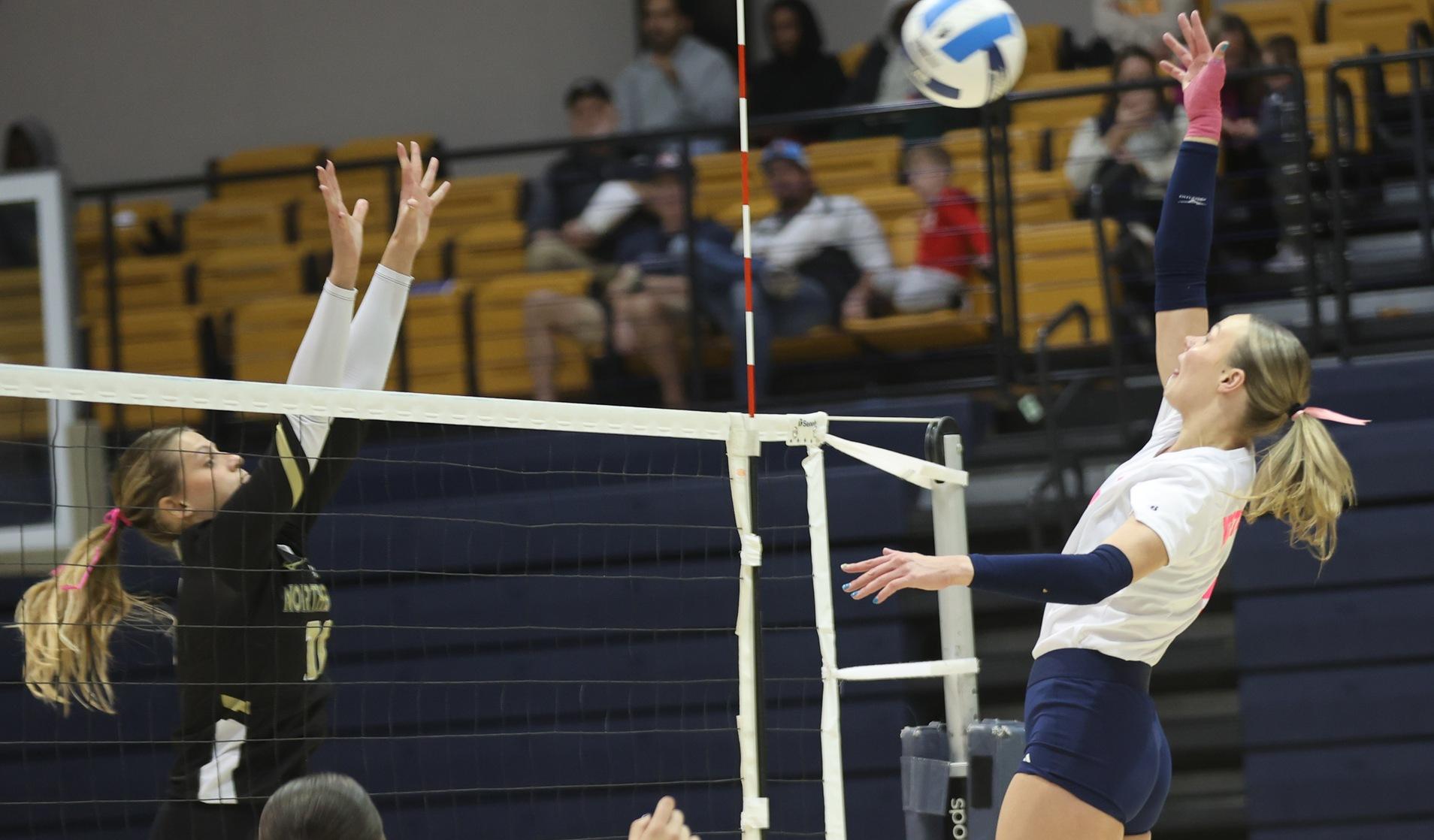 Lilly Zwart hammers a kill during a match in the fall.