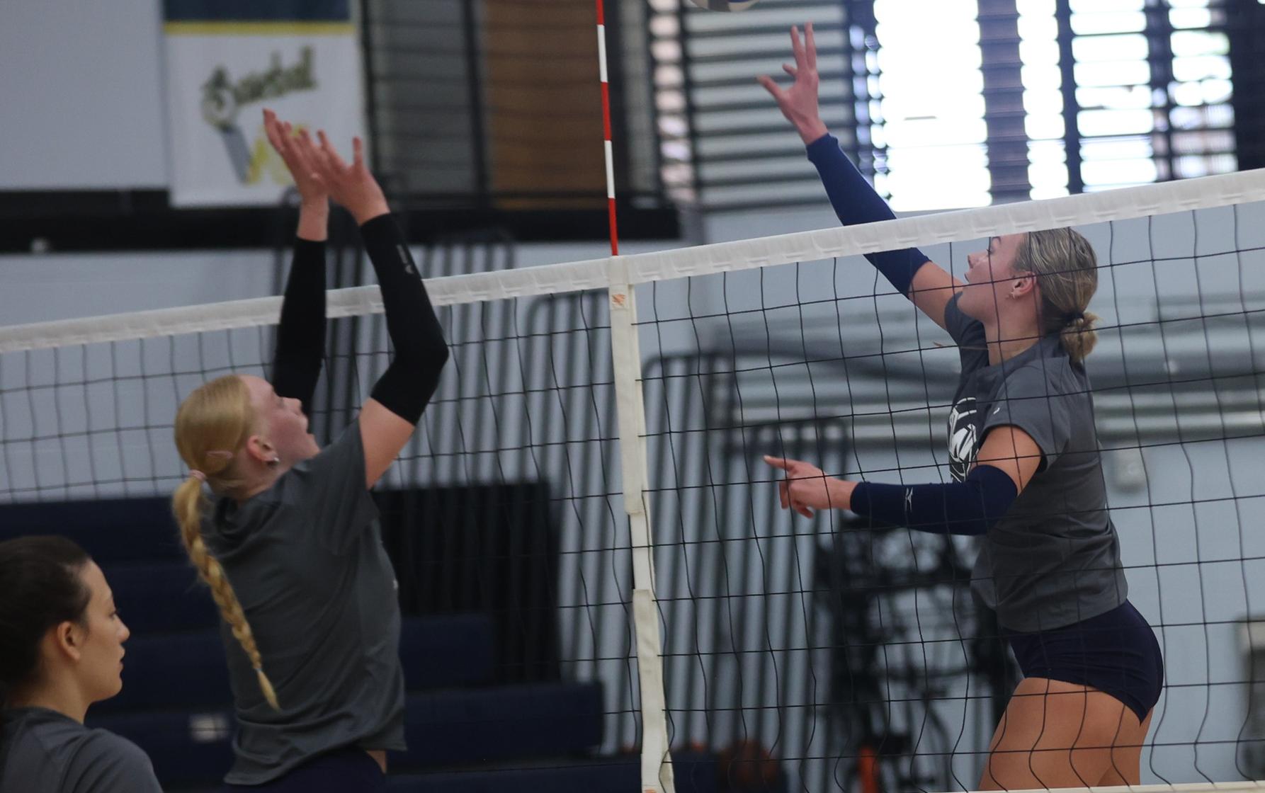 Finja Schul goes up for a block on Lilly Zwart during a practice on Saturday.