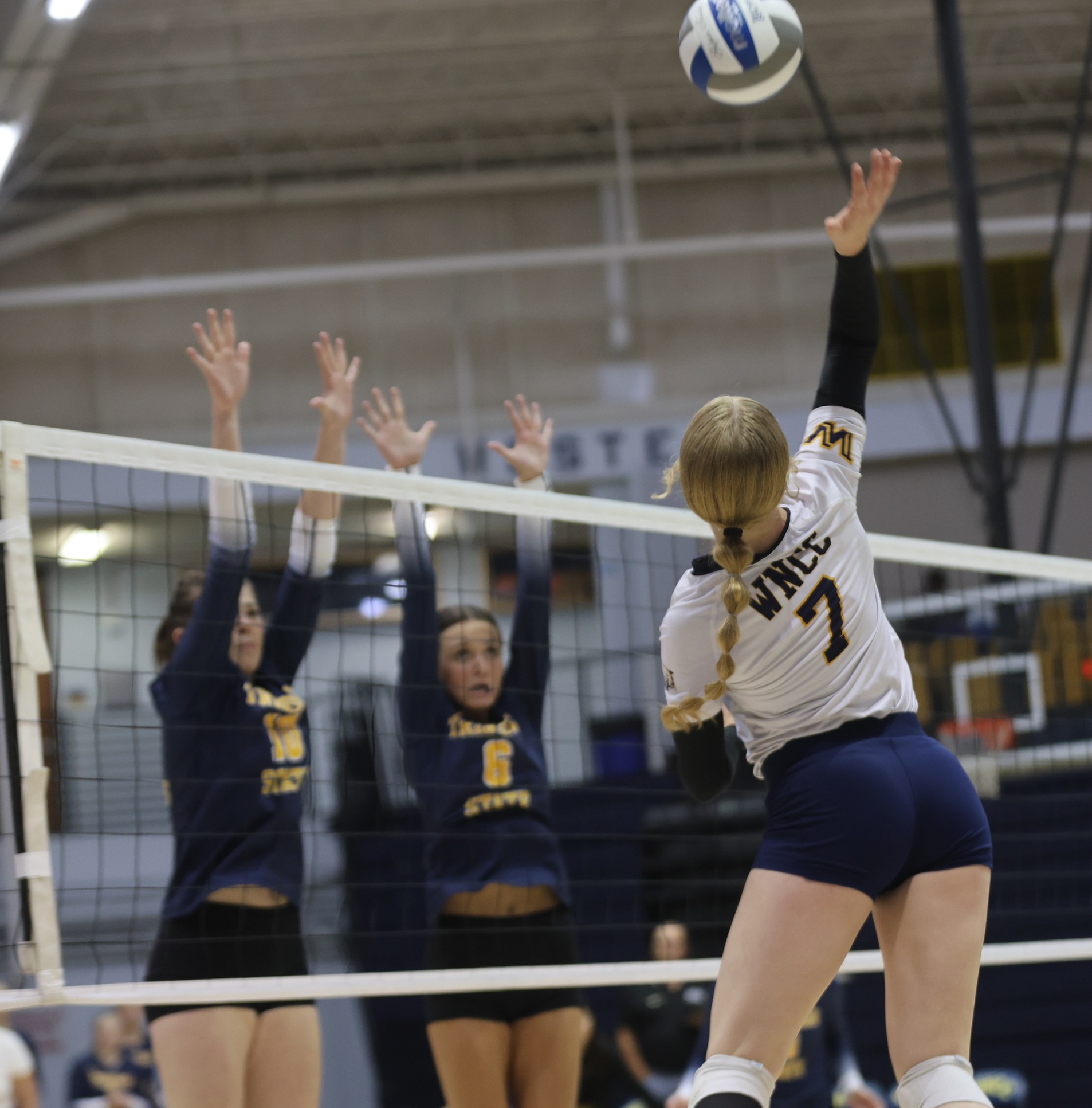 Tamika Eastman hits a kill in a match against Trinidad when they came to Cougar Palace earlier this season.