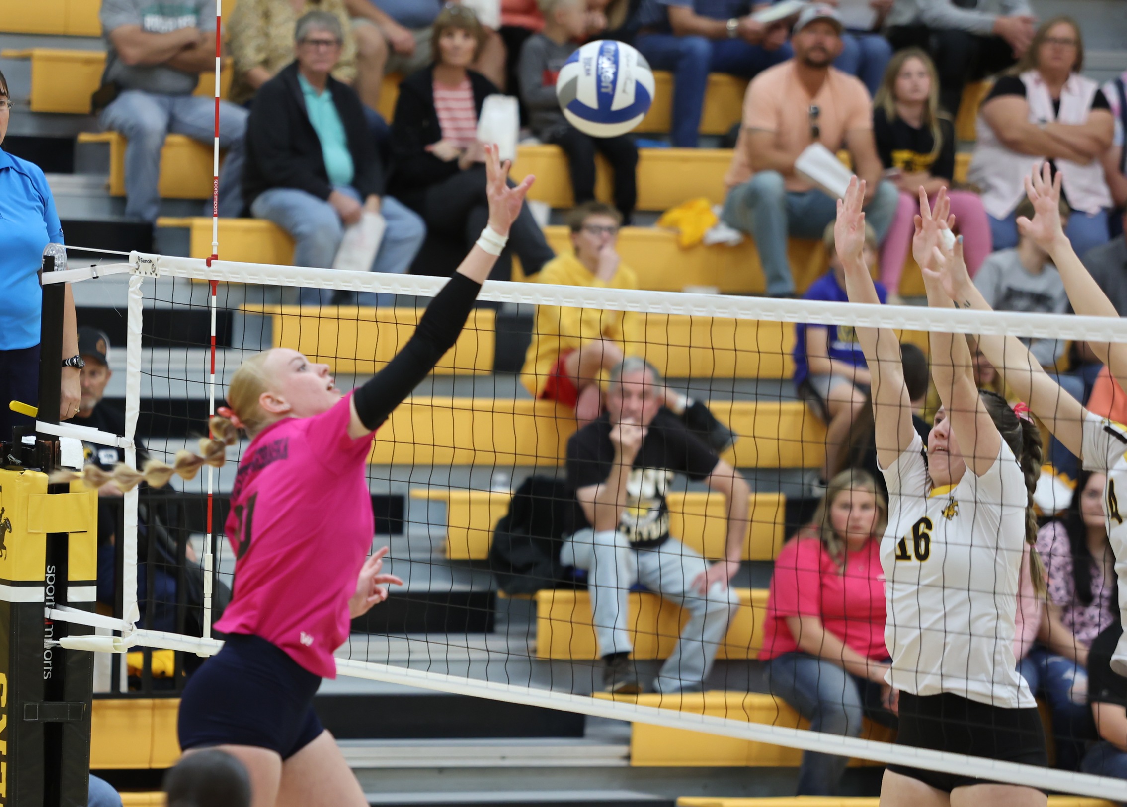 Finja Schul goes for a kill against EWC at Torrington on Tuesday. The Cougars swept the Lancers. (Photo by Doug Jones)