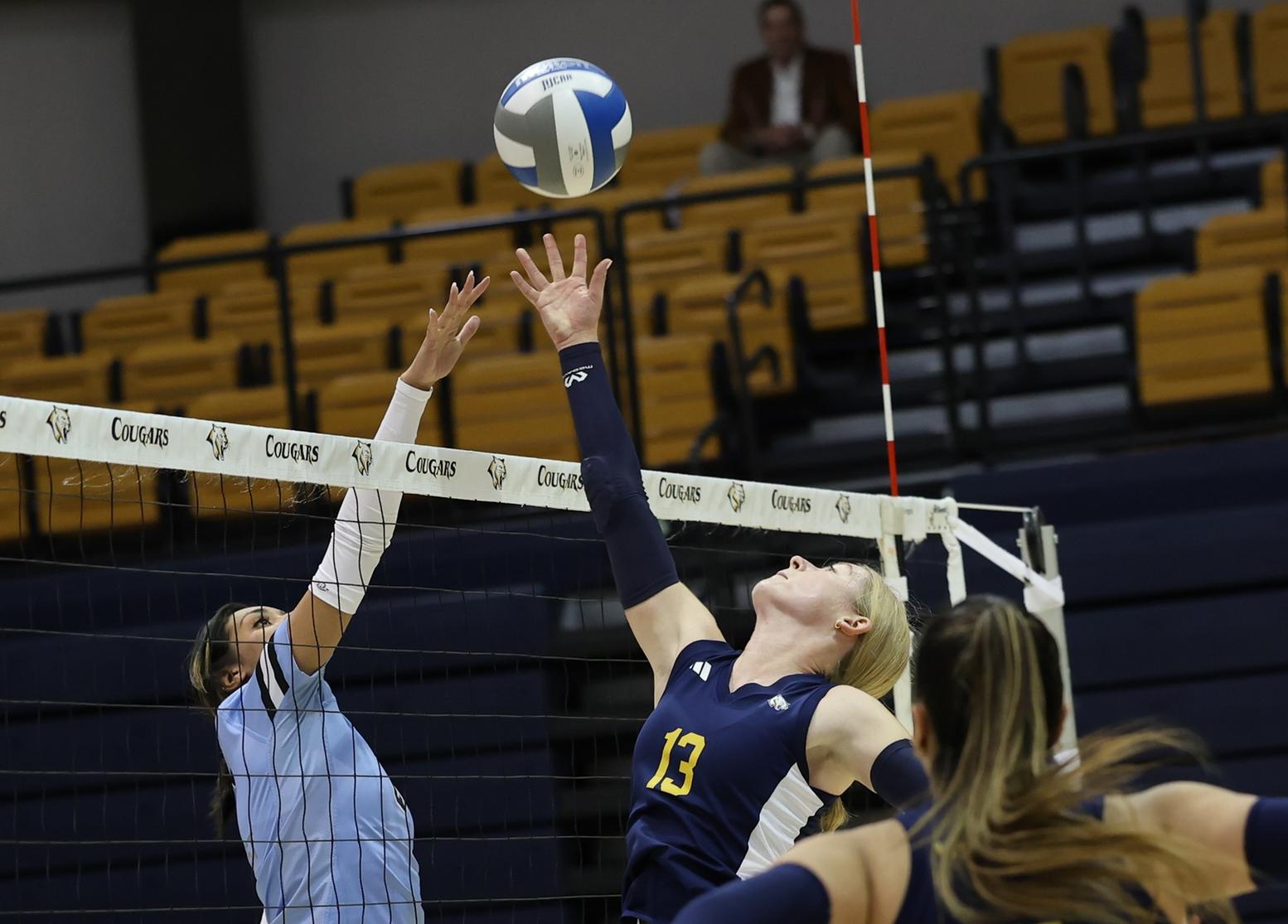Allie Twamley goes up to tip the ball over the net against Southeast on Saturday.